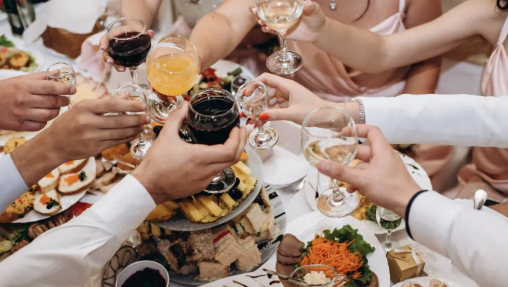 Group toast at a catered wedding reception